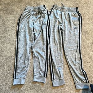 Adidas track pants lined inside. Sold as a pair!